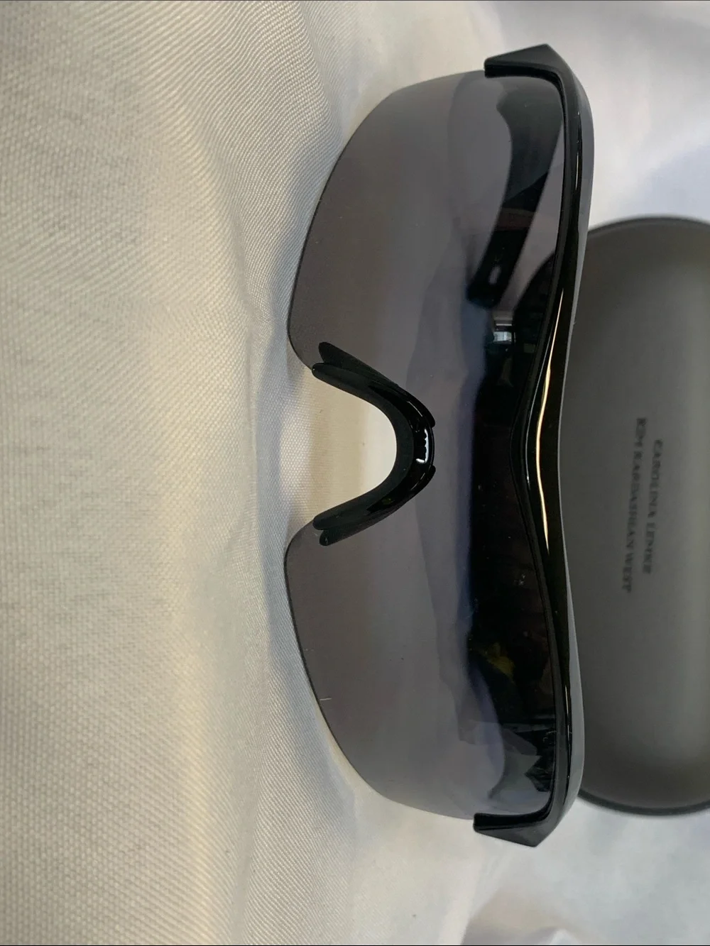 Sleek Black Sunglasses with Hard Zipper Case